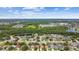Aerial view of a suburban neighborhood close to green spaces at 1041 Cherry Valley Way, Orlando, FL 32828