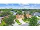 Charming one-story home featuring a well-manicured lawn and attached two-car garage at 1041 Cherry Valley Way, Orlando, FL 32828