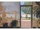 Enjoy the view into the brick-paved backyard from this peaceful Florida room at 1041 Cherry Valley Way, Orlando, FL 32828