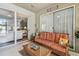 Warm Florida room with an open view into the living room and backyard at 1041 Cherry Valley Way, Orlando, FL 32828