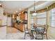 Cozy eat-in kitchen featuring granite counters and a sunny breakfast nook at 1041 Cherry Valley Way, Orlando, FL 32828