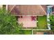 Backyard patio aerial shot with outdoor seating and landscape at 1041 Cherry Valley Way, Orlando, FL 32828