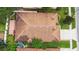 Birds-eye view of home showing roof and patio area with table and chairs at 1041 Cherry Valley Way, Orlando, FL 32828