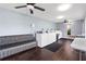 Community laundry room with multiple washing machines and folding tables at 1100 E Caroline St # 204, Tavares, FL 32778