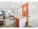 Charming living room seamlessly connected to the kitchen, featuring modern amenities and comfortable seating at 1100 E Caroline St # 204, Tavares, FL 32778