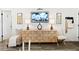 Stylish living room featuring elegant decor, comfortable seating, and a serene ambiance for relaxing and entertaining at 1100 E Caroline St # 204, Tavares, FL 32778