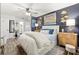 This well-decorated main bedroom features stylish decor and a large area rug at 1100 E Caroline St # 204, Tavares, FL 32778