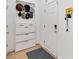 Foyer with a white organizer and hooks at 12255 Joshua Tree Trl, Windermere, FL 34786