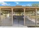 An inviting covered picnic pavilion with ample seating for gatherings and outdoor dining at 12255 Joshua Tree Trl, Windermere, FL 34786