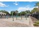 Community splash pad offering Gathering fun, set against the backdrop of palm trees at 12255 Joshua Tree Trl, Windermere, FL 34786