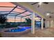 Backyard pool area featuring an inground pool with a spa and water fountains, surrounded by brick pavers at 13025 Lake Roper Ct, Windermere, FL 34786
