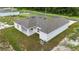 Aerial view of a single story home with a gray roof at 1304 Hillsborough Ct, Kissimmee, FL 34759