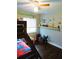 bedroom featuring a bunk bed, toys, a window and dark hardwood floors at 1361 Sterling Oaks Dr, Casselberry, FL 32707