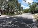 Quiet street view showcasing the neighborhood's well-maintained lawns and mature trees at 1361 Sterling Oaks Dr, Casselberry, FL 32707