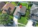 Charming single-Gathering home boasts lush lawn, landscaped garden, and two-car garage at 14130 Leicester Ln, Orlando, FL 32828