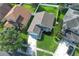 Charming single-Gathering home boasts lush lawn, landscaped garden, and two-car garage at 14130 Leicester Ln, Orlando, FL 32828