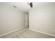 Bedroom showcasing neutral carpet, paint, and window bringing in light at 14130 Leicester Ln, Orlando, FL 32828