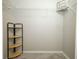 Walk-in closet with shelving for organized storage at 14130 Leicester Ln, Orlando, FL 32828