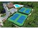 Aerial view showcasing community pool and tennis courts in a well-maintained setting at 14130 Leicester Ln, Orlando, FL 32828