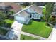 Well-maintained front yard and landscaping at 14130 Leicester Ln, Orlando, FL 32828
