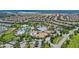A beautiful aerial view of the community featuring a luxurious pool and clubhouse at 1442 Moon Valley Dr, Davenport, FL 33896