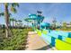 Enjoy outdoor fun with a community water slide surrounded by professional landscaping at 1442 Moon Valley Dr, Davenport, FL 33896