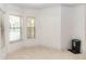 Bright dining area with corner windows and neutral tile flooring at 1908 S Farm Rd, Deland, FL 32720