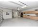 Spacious two-car garage with ample storage and workspace at 1908 S Farm Rd, Deland, FL 32720
