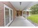 Covered patio area, perfect for outdoor relaxing and entertaining at 1908 S Farm Rd, Deland, FL 32720