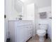 Bright bathroom featuring a new vanity with countertop and a modern mirror at 2006 Stone Abbey Blvd, Orlando, FL 32828