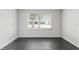 Flex room with slate floor and a large window bringing in lots of light at 25 E Pinecrest Ave, Eustis, FL 32726