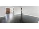 Cozy living area featuring refinished floors, archways to dining room, and well-maintained trim at 25 E Pinecrest Ave, Eustis, FL 32726