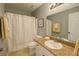 Well-maintained bathroom with shower-tub, granite counters and ample storage at 2550 Alafaya Trl # 9303, Orlando, FL 32826