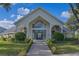Clubhouse featuring manicured grounds, a walkway, and multiple arched windows at 2550 Alafaya Trl # 9303, Orlando, FL 32826