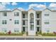 Well-maintained three-story building with neat landscaping, creating a welcoming and visually appealing facade at 2550 Alafaya Trl # 9303, Orlando, FL 32826