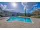 Inviting community pool surrounded by brick pavers, offering a relaxing retreat for residents and guests at 2550 Alafaya Trl # 9303, Orlando, FL 32826