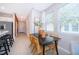 Dining room with natural lighting, modern furnishings, and tile floors at 2596 Penguin Blvd, Davenport, FL 33837