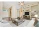 Tastefully decorated living room with a cozy seating area, media center, and stylish decor, creating a comfortable space at 2905 Elbert Way, Kissimmee, FL 34758