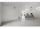 Spacious open-concept living area leading to the updated kitchen at 2978 Stillwater Dr, Kissimmee, FL 34743