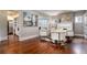 Bright living room featuring a fireplace, hardwood floors, and stylish furnishings for comfortable living at 3 W Yale St, Orlando, FL 32804