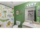 bathroom featuring colorful shower curtain and a single sink at 3055 Ashland N Ln, Kissimmee, FL 34741