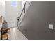 Bright entryway with soaring ceilings and a staircase leading to the upper level at 3055 Ashland N Ln, Kissimmee, FL 34741
