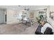 Spacious game room features a ping pong table, comfortable seating, and stylish decor at 3404 Shallow Cove Ln, Clermont, FL 34711