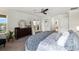 Spacious main bedroom featuring outdoor balcony access and neutral décor at 3404 Shallow Cove Ln, Clermont, FL 34711