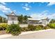 Innovation at Hidden Lake sign surrounded by lush landscaping at 3404 Shallow Cove Ln, Clermont, FL 34711
