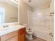 Clean bathroom featuring a vanity, a mirror, a toilet, and a shower with a tub combo at 428 Danube Way, Kissimmee, FL 34759