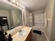 Full bathroom featuring a tub and shower combination, and modern vanity at 428 Danube Way, Kissimmee, FL 34759