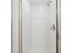 Shower stall featuring white tiling, shower head and updated hardware at 4558 Baleno Ln, Kissimmee, FL 34746