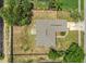 Overhead aerial shot of a private residence with a landscaped yard, surrounded by a wooden fence for added privacy at 4836 Pierce Arrow Dr, Apopka, FL 32712