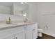 Modern bathroom with double vanity, white cabinets, and brushed gold fixtures at 4836 Pierce Arrow Dr, Apopka, FL 32712